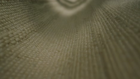 closeup of an expertly tailored suit that beautifully showcases its sophisticated buttons and fine fabric texture