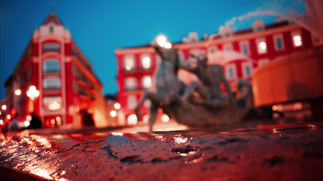 Nice, France - October 8, 2024: Close up of the Fontaine du Soleil at Place Massena in the evening