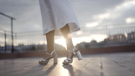 rich high heels fashion trends ad at golden hour