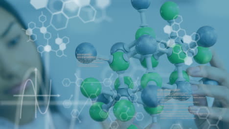 animation of data processing over caucasian woman with model in lab