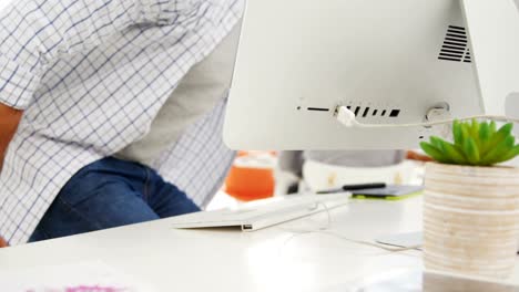 male executive working on computer