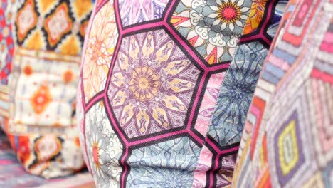 close-up of colorful fabric with geometric and floral patterns