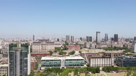 Aerial-parallax-shot-of-Puerto-Madero-waterfront-and-Buenos-Aires-government-buildings