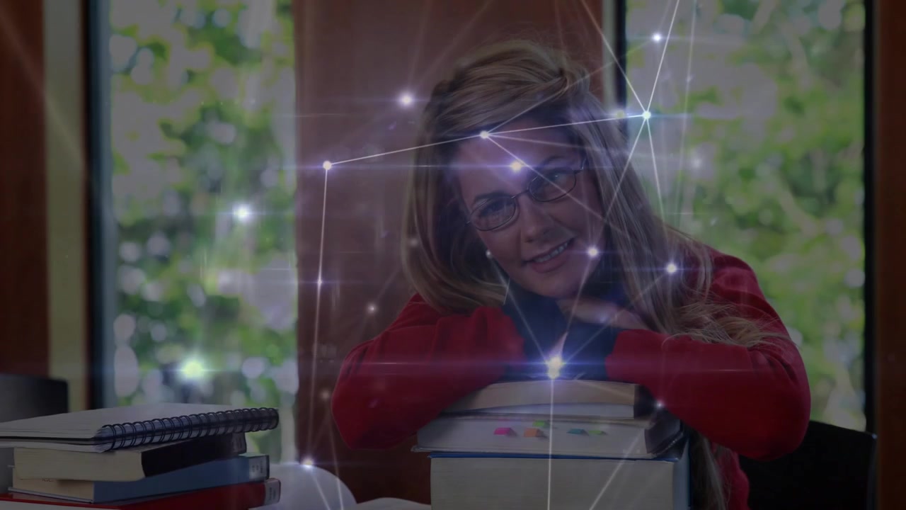 Woman leaning on books, tech network overlay brightening across face, illustrating tech concept