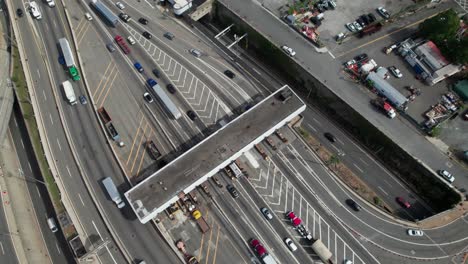 Overhead-aerial-of-a-toll-plaza-bottleneck,-4K