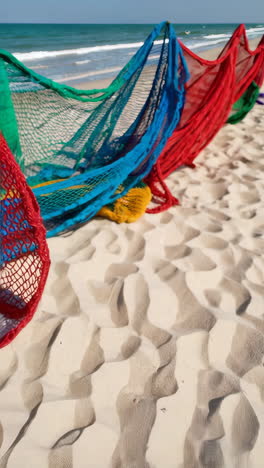 colorful nets drying on the beach