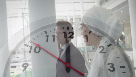 clock animation over business people walking in modern office building