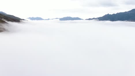 clouds cover the mountains in northwest vietnam