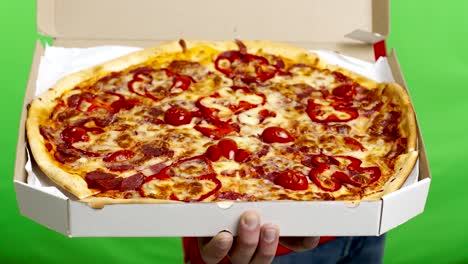 delivery man opening box with tasty hot pizza, close up