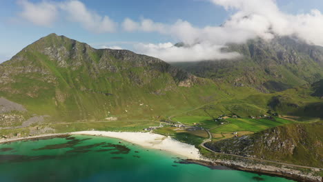 wide aerial footage of vik beach and hauklandstranda norway, coastline drone shot with turquoise blue water