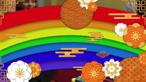 animation of rainbow and flowers over caucasian friends smiling