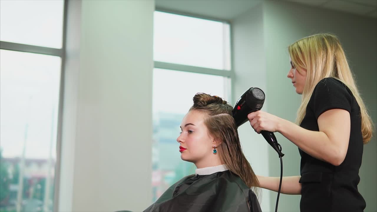 Hair Salon: Woman Getting Hair Blow-Dry