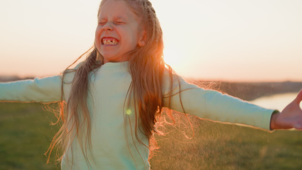 Girl embraces rain with each joyful jump child delight grows with heart overflowing with simple joy