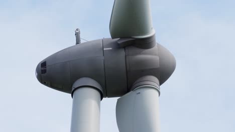 handheld shot of a wind turbine in operation on the outer hebrides