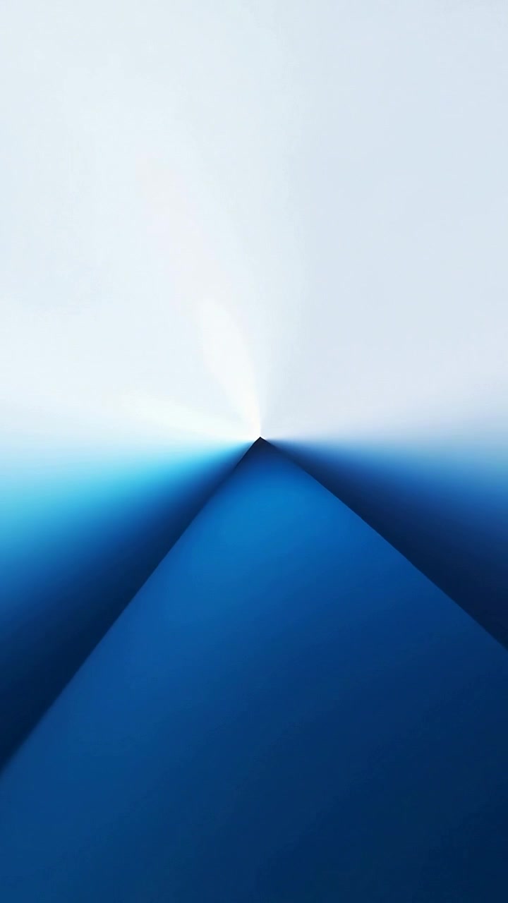 Vertical video: Spark appearing, dark triangle rising toward apex in tall frame, forming transition