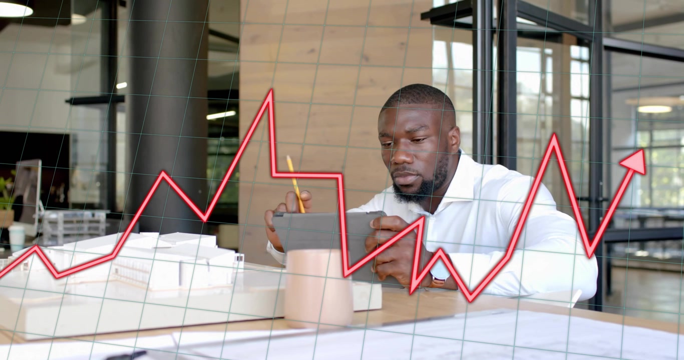 Analyst adjusting tablet and pencil, showing animated red line chart on grid tracking market trends
