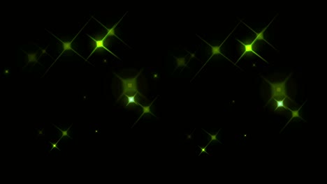 la luz verde de la animación brilla sobre un fondo negro.