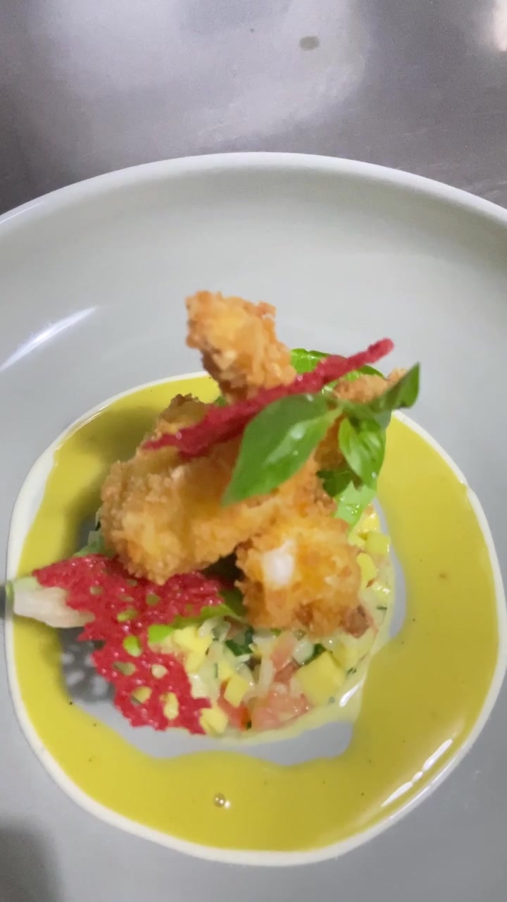 Gourmet Fried Shrimp Appetizer Plated with Vegetable Tartare and Sauce