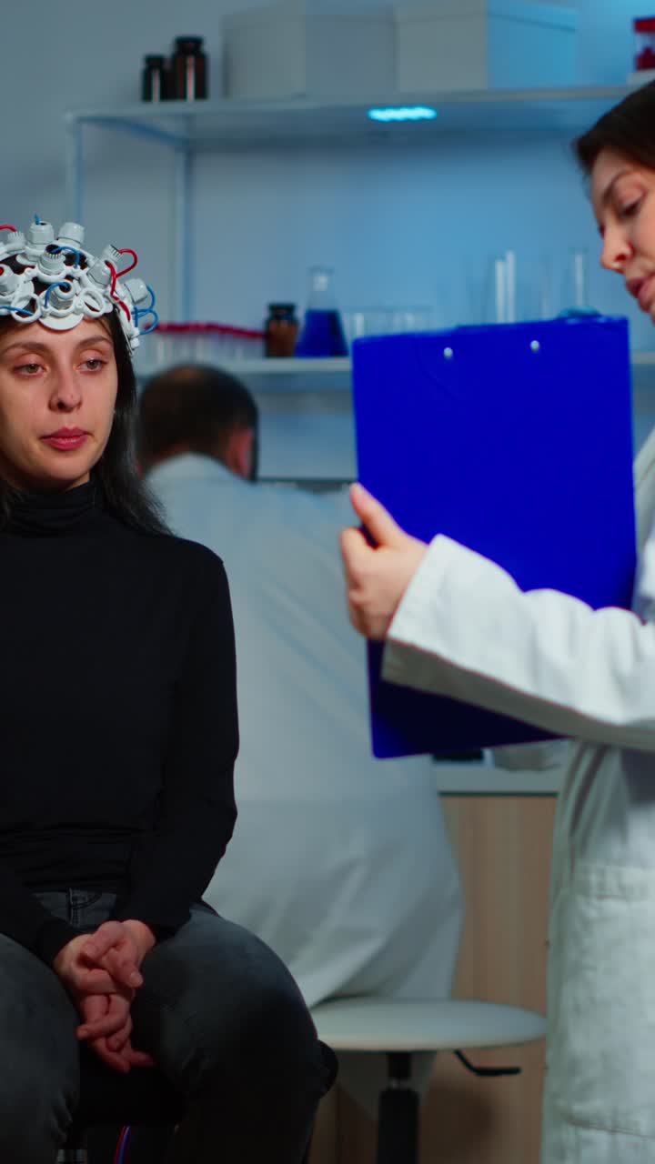 Woman Undergoing EEG Brain Scan in a Laboratory Setting