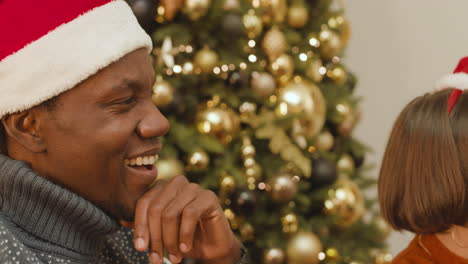 man celebrating christmas with his girlfriend