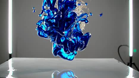 blue ink splash and reflection