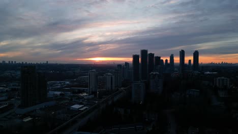 scenic cityscape in the evening, colorful sunset sky