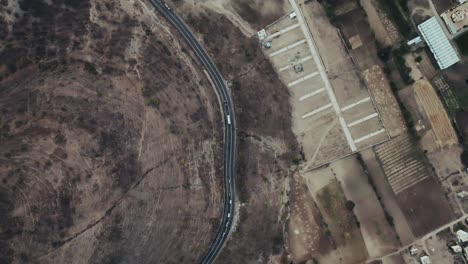 4k drone shot of a mountain road from above