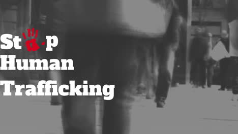 animation of stop human trafficking text over people walking