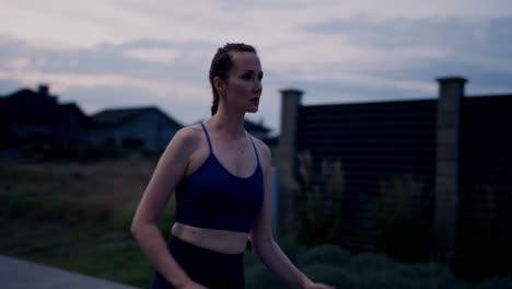 woman running outdoors at dusk