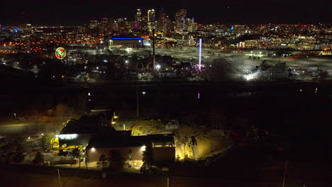 Aerial-view-of-Tilting-Shot-of-Downtown-Denver-at-Night