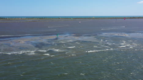 Kiteboarders-aerial-shot-mediterranean-sea-in-background-France-Etang-de-Thau