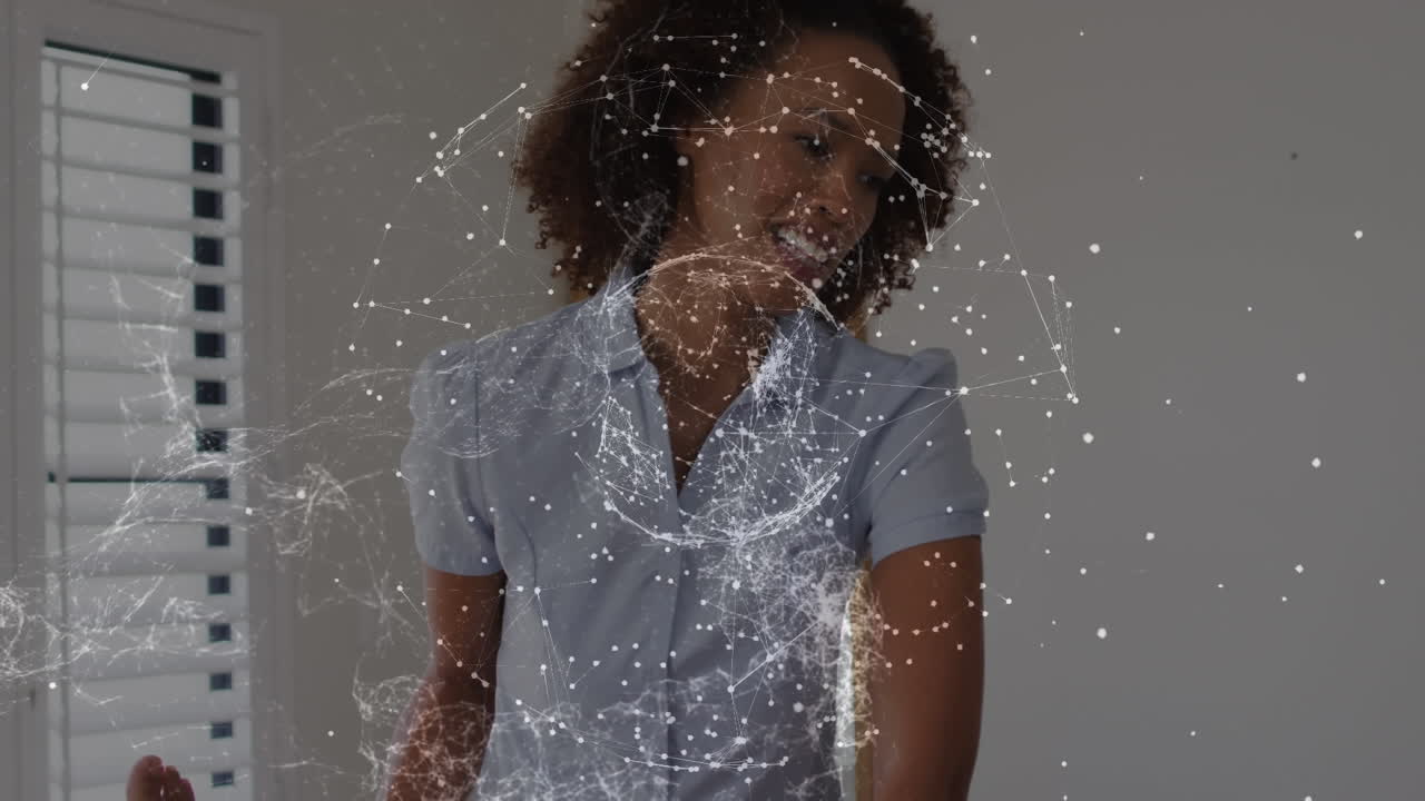 Animation of globe of connections over diverse doctor and patient exercising