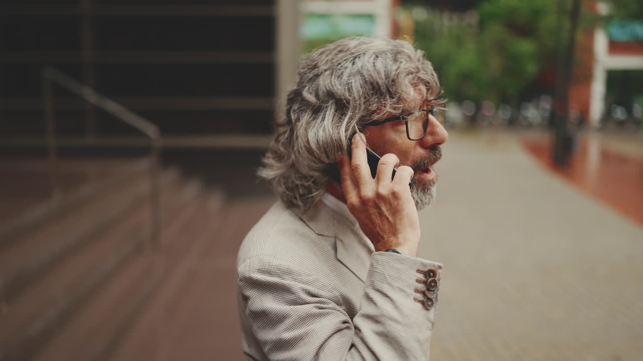 Older man talking on the phone