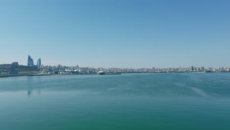 baku city panorama from the caspian sea - skyline with flame towers