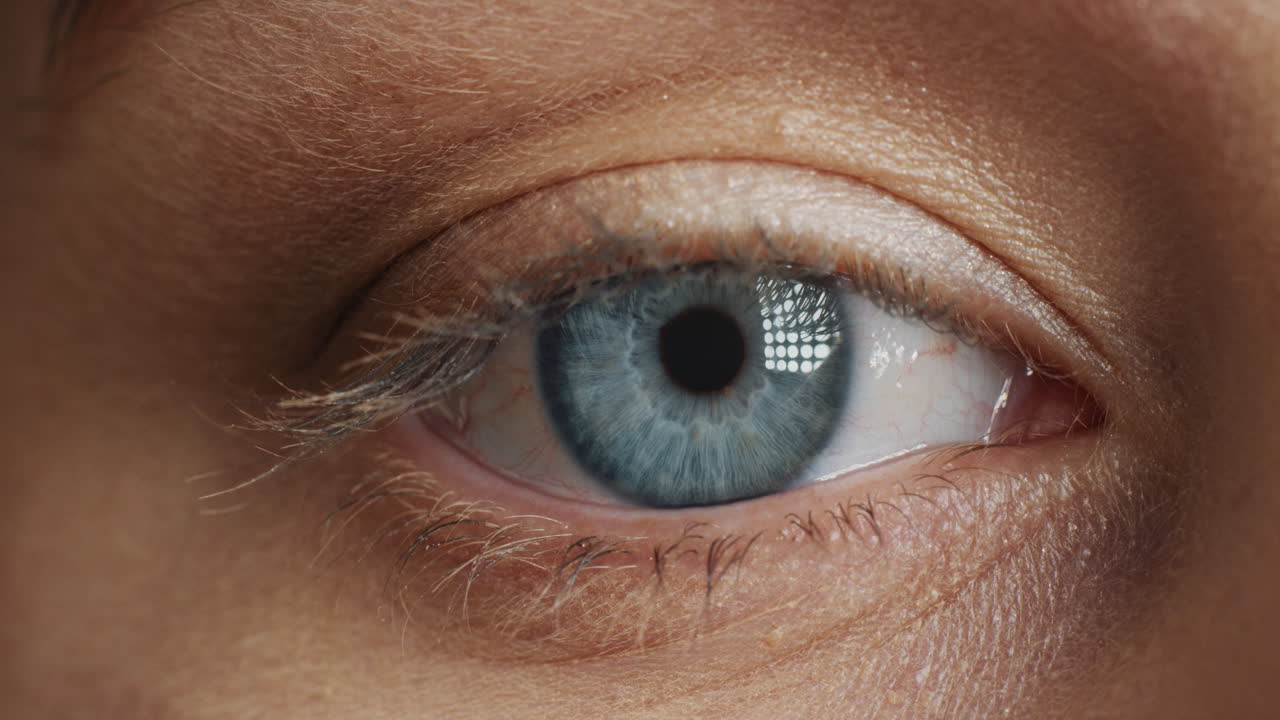 macro beauty human eye opening blinking beautiful blue iris close up
