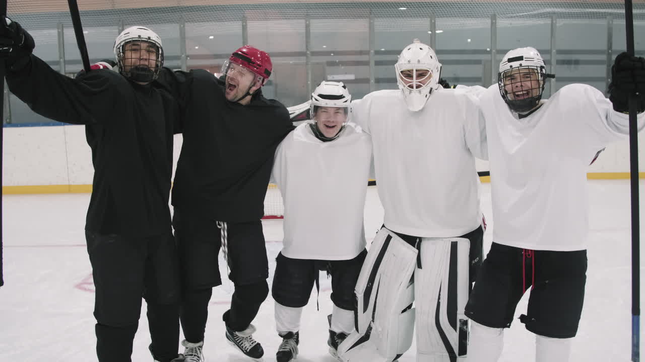 Portrait Of Cheerful Hockey Players
