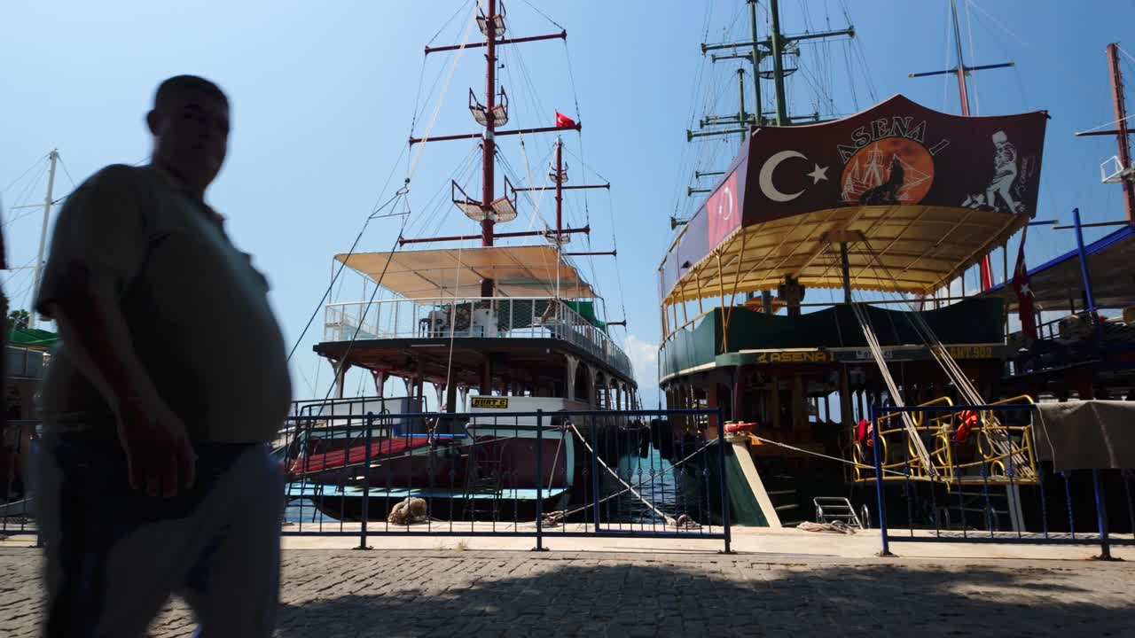 Details of Antalya marina, featuring boats and the peaceful atmosphere of a Turkish morning