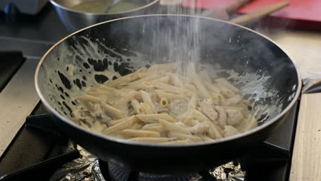master of flavor: freshly cooked pasta in action!