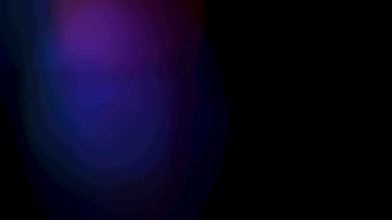 Beautiful colorful cinematic subtle light leaks, rainbows, and streaks shot with a professional cinema lens - can be used with any NLE as an overlay or background