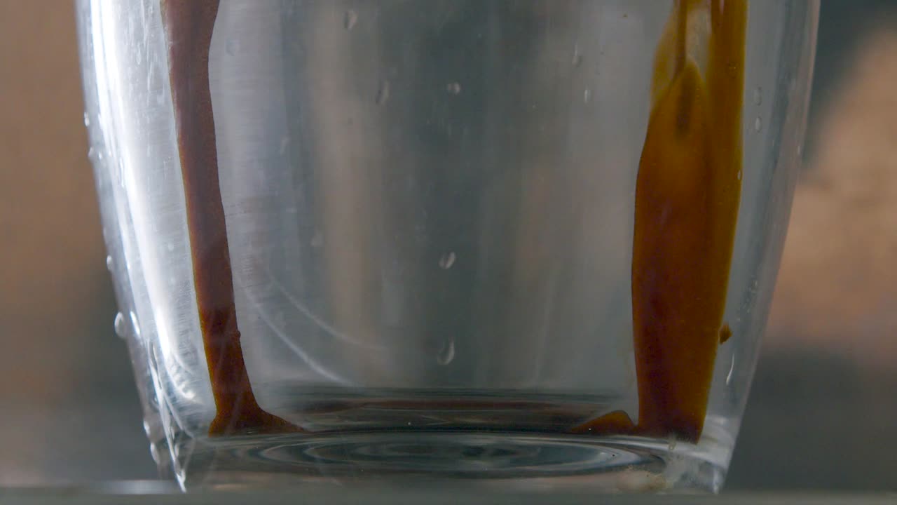 Close up Espresso Pull into Glass Slow Motion