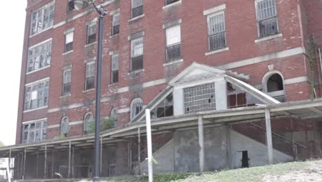 front view of dilapidated mental institution