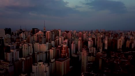 Surreal-drone-shot-of-Sao-Paolo-city-center-with-blue-sky-and-pink-sunset