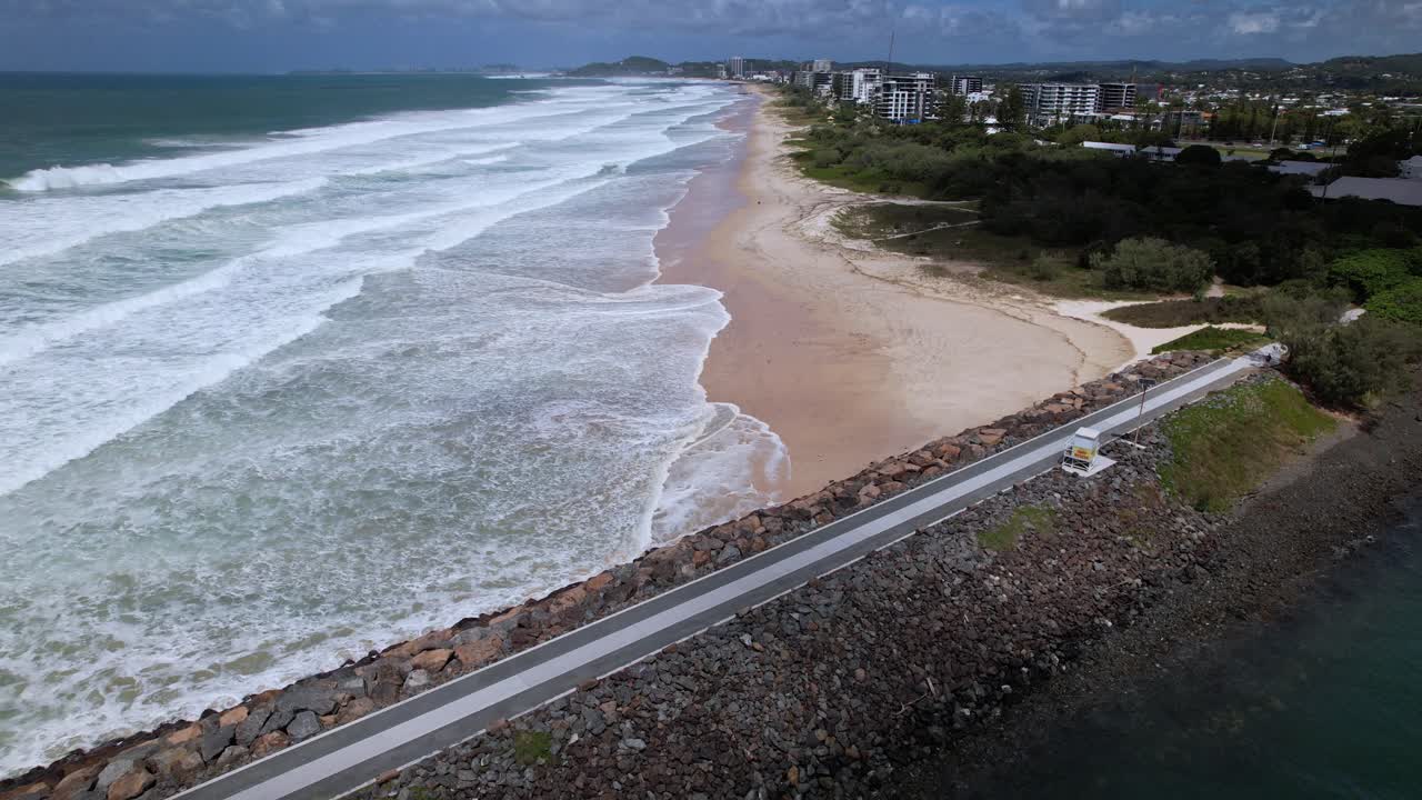 Tallebudgera Beach And Seawall With Ocean Waves In Burleigh Heads, Queensland, Australia. aerial shot