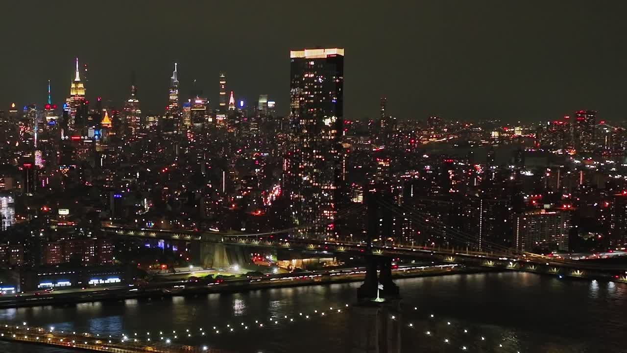 Night view of New York City skyline from a drone perspective