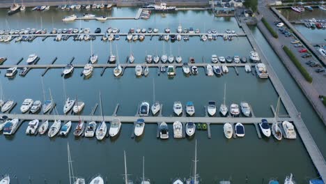 close-up aerial view of boats tied up in dock along helsinki, finland waterfront