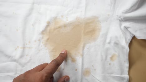 coffee stain on a white shirt