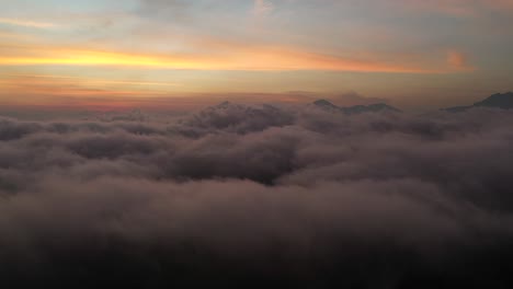colorful sky above the dreamy peaceful clouds over the mountain
