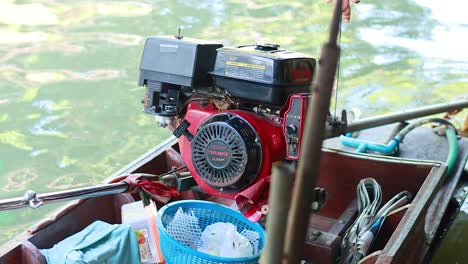 engine on boat at bangkok floating market