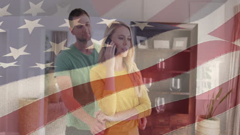 animation of american flag over couple embracing at home