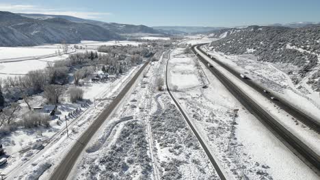 aerial footage descending towards interstate 70, the eagle river and the grand army of the republic highway